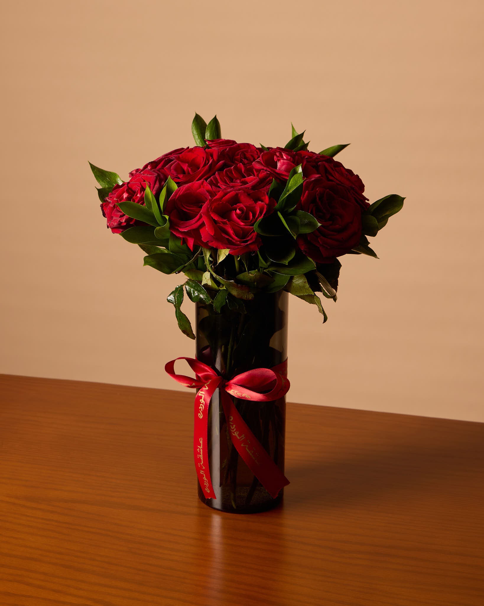 Red Roses In Black Vase