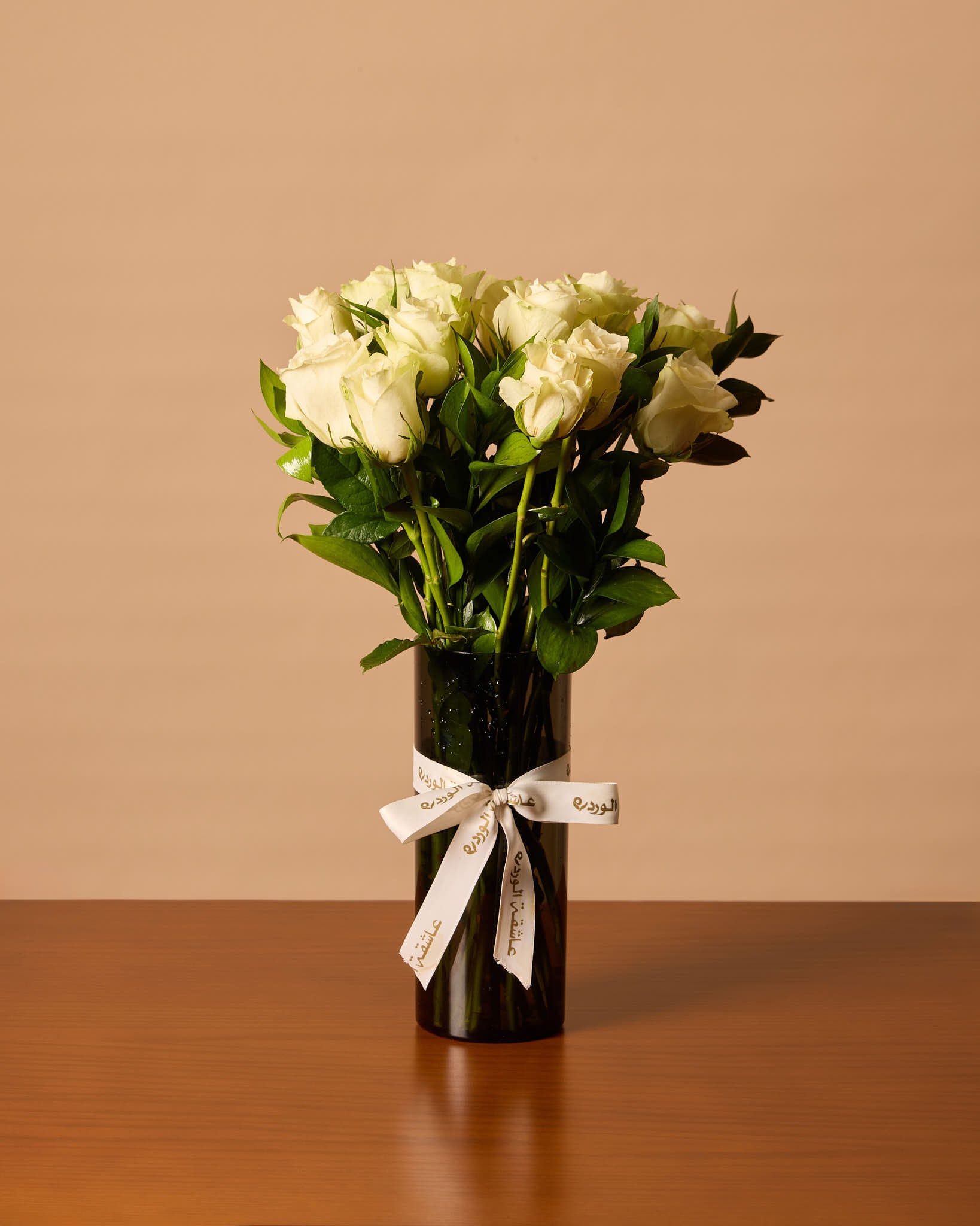 White Roses In Black Vase