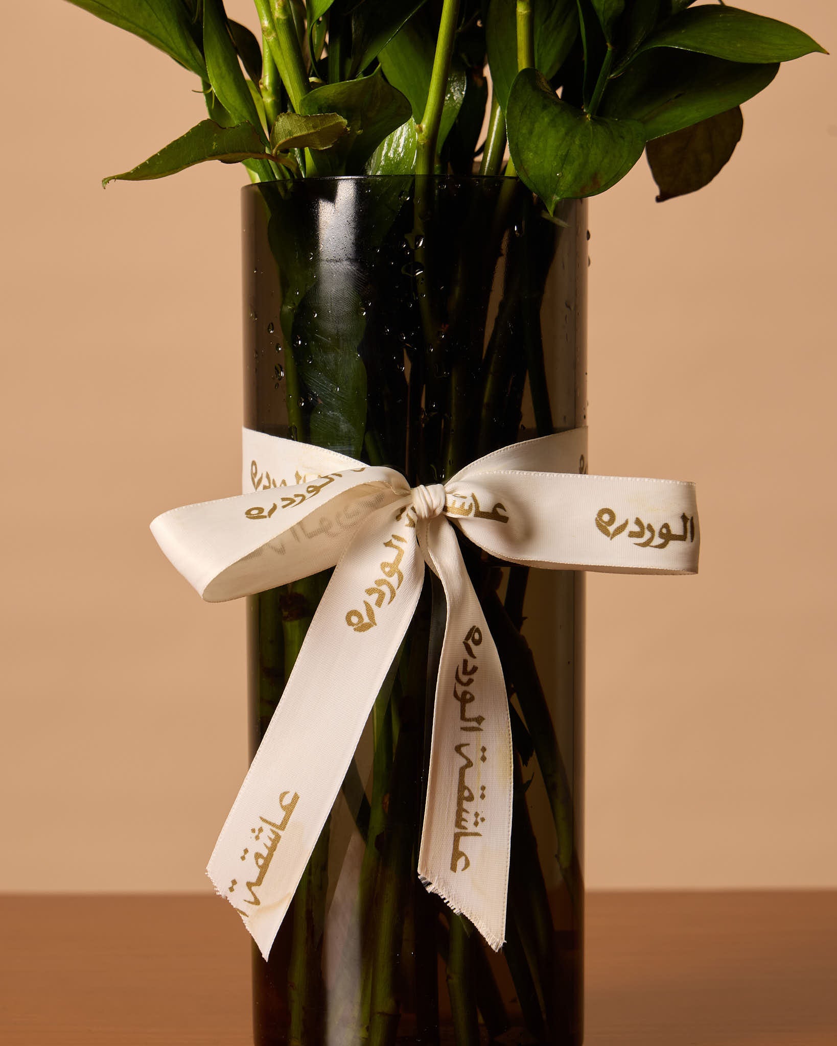 White Roses In Black Vase