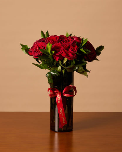 Red Roses In Black Vase