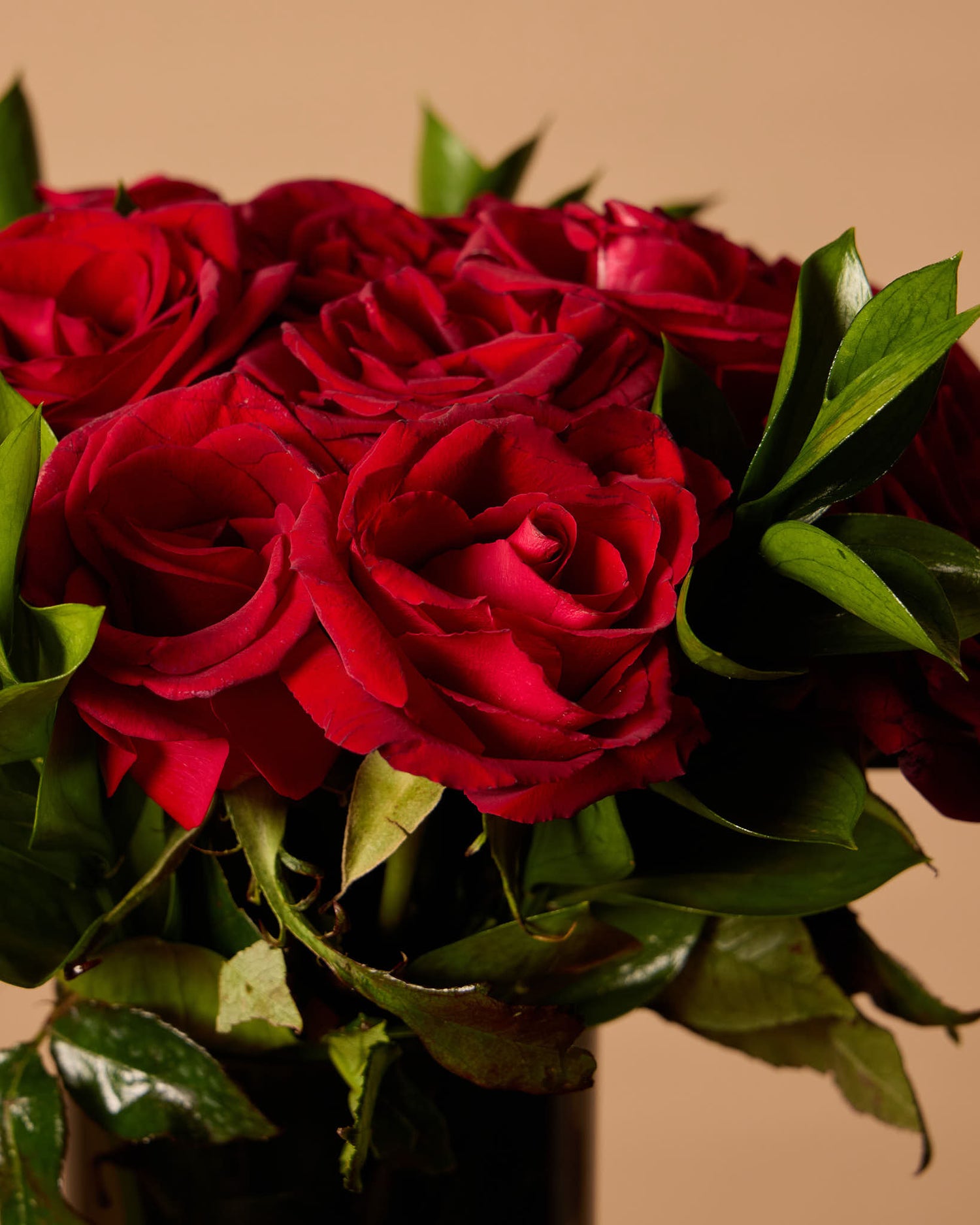 Red Roses In Black Vase
