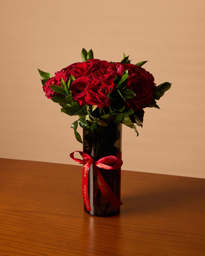 Red Roses In Black Vase
