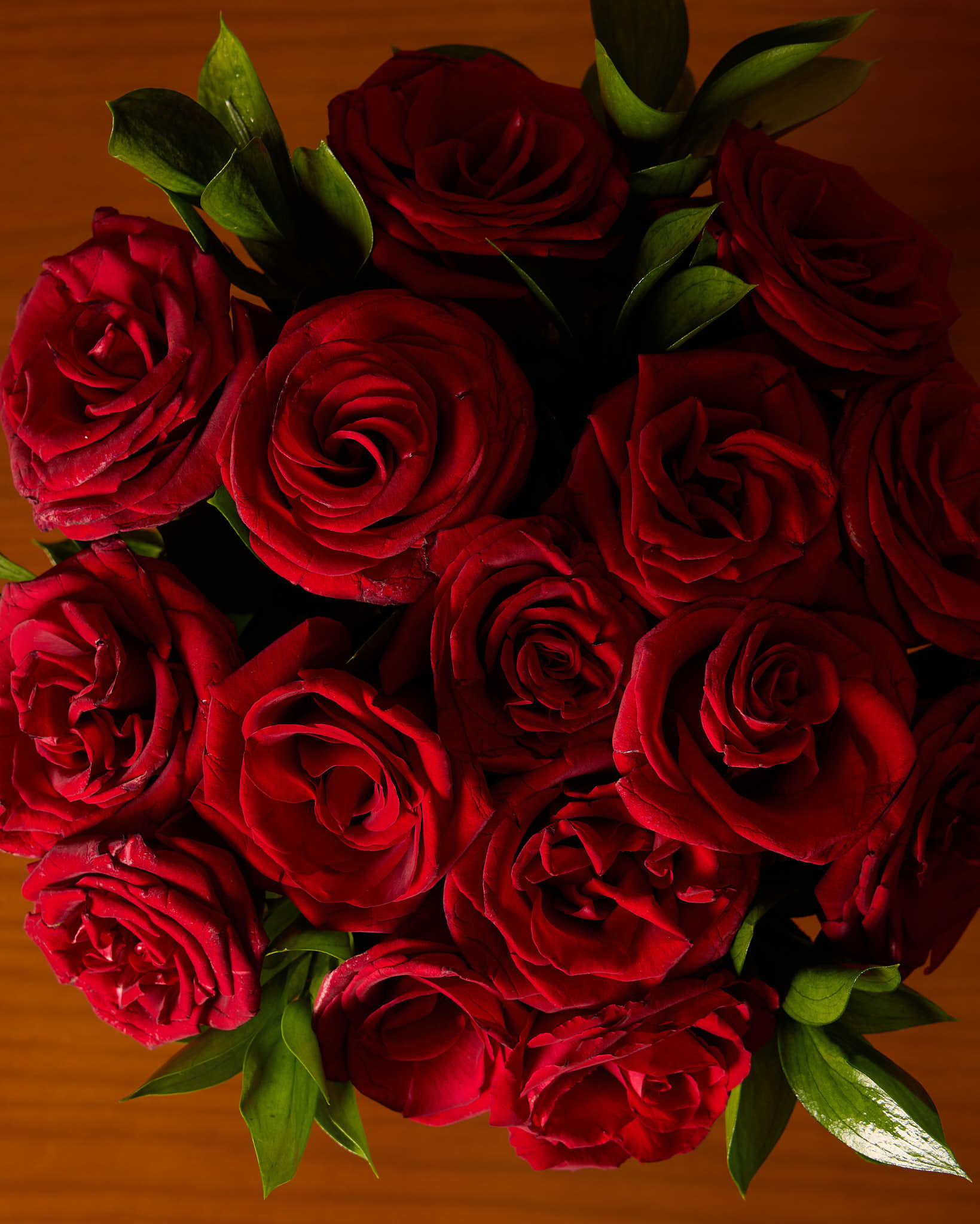 Red Roses In Black Vase