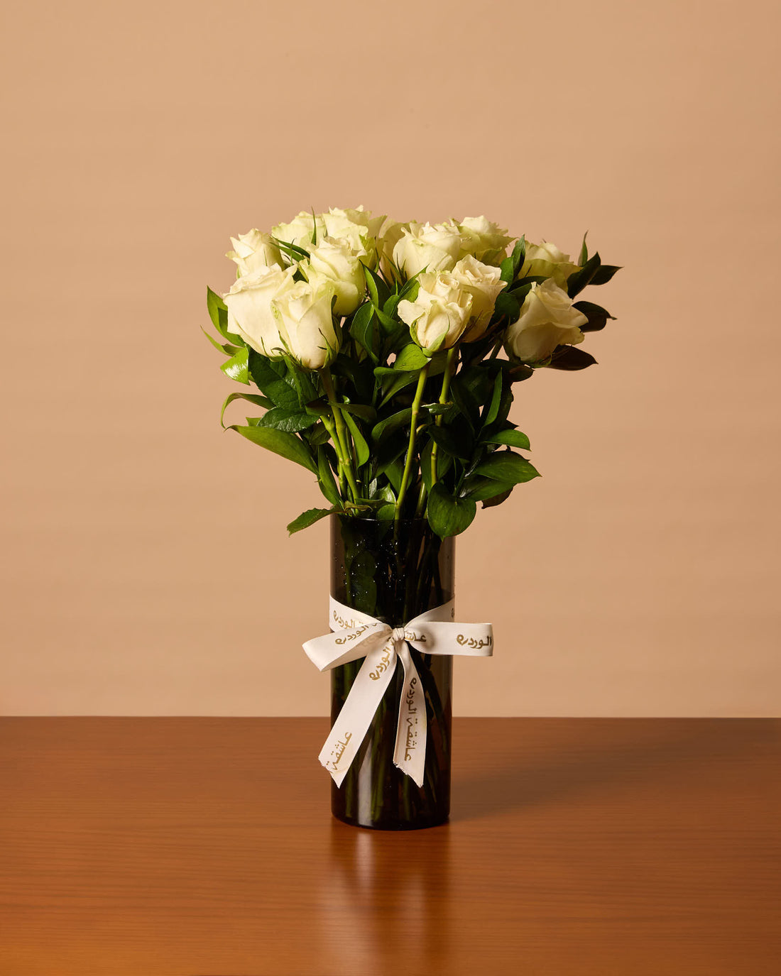 White Roses In Black Vase