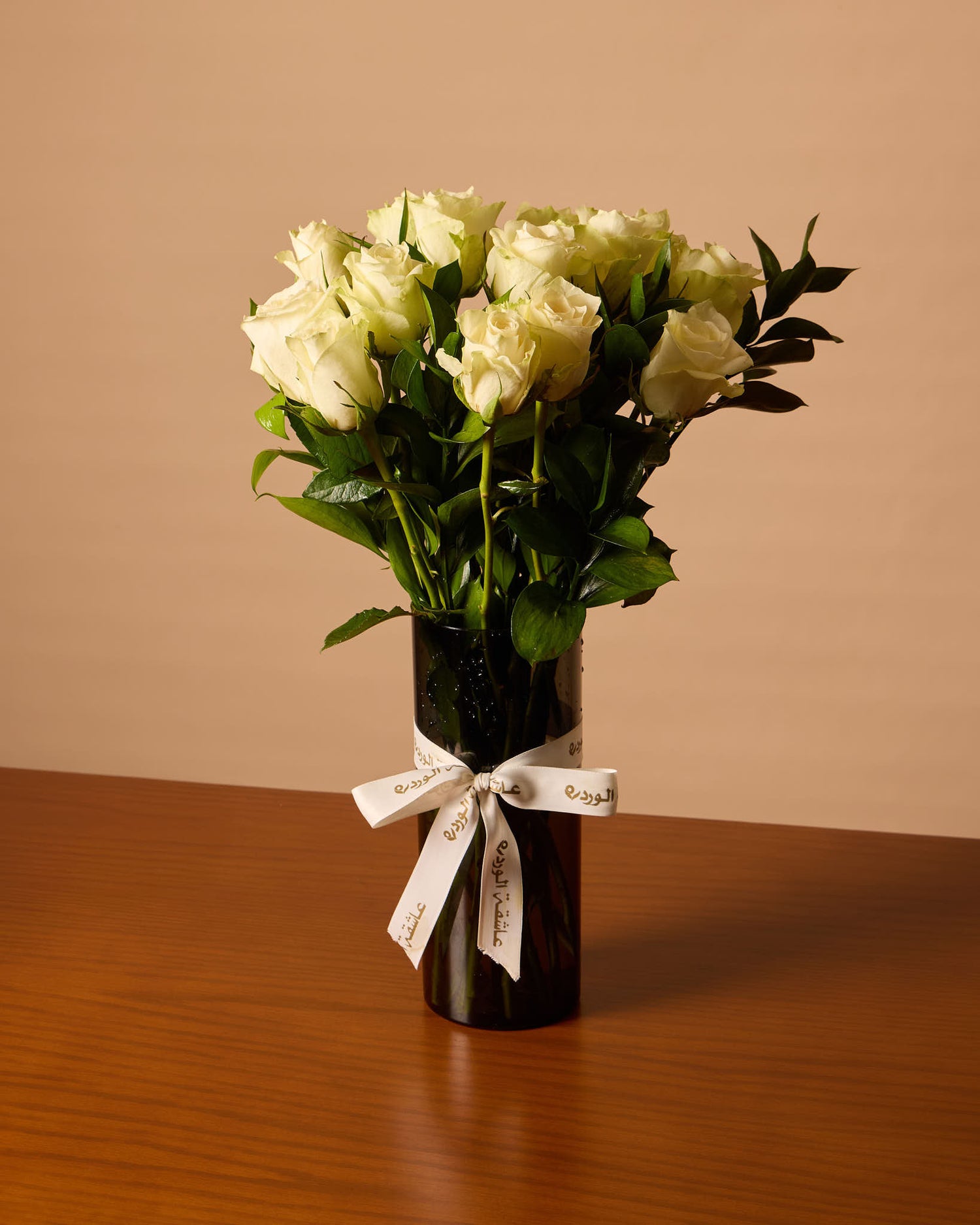 White Roses In Black Vase